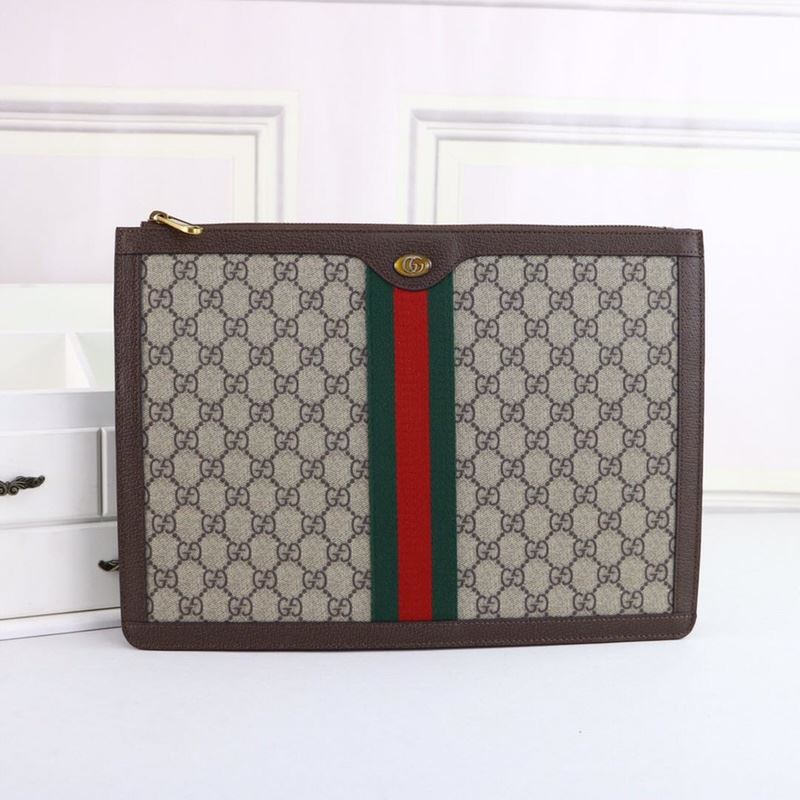 G*u*i clutch bags